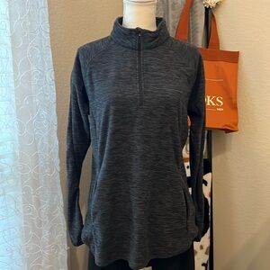 lightweight ladies fleece 1/4 zip top. Pass through zippable kangaroo pocket
